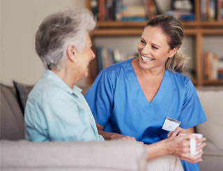 NHS Care worker caring for patient