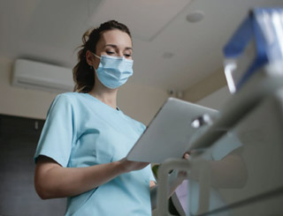 NHS nurse wearing protective face mask