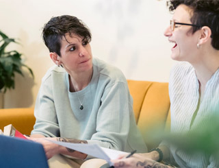 Social care worker with patient